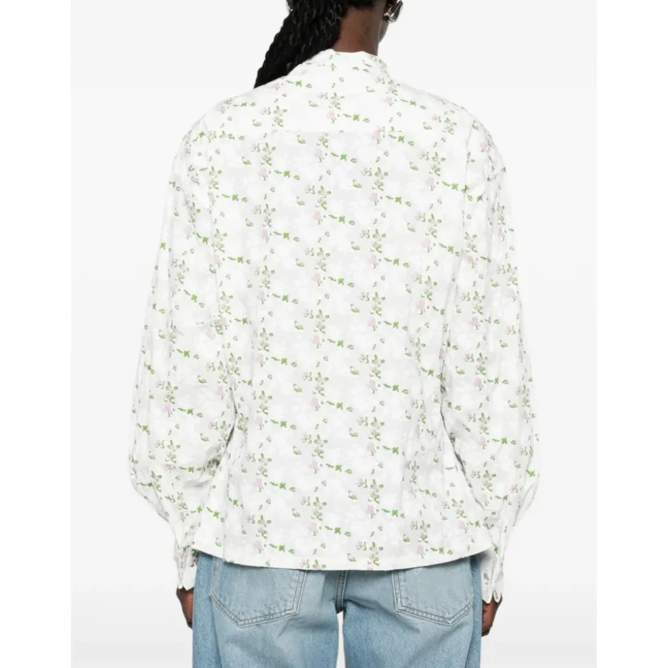 Blusa con cuello volante