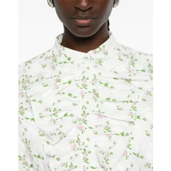 Blusa con cuello volante