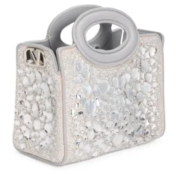 Bolso de mano con pedrería
