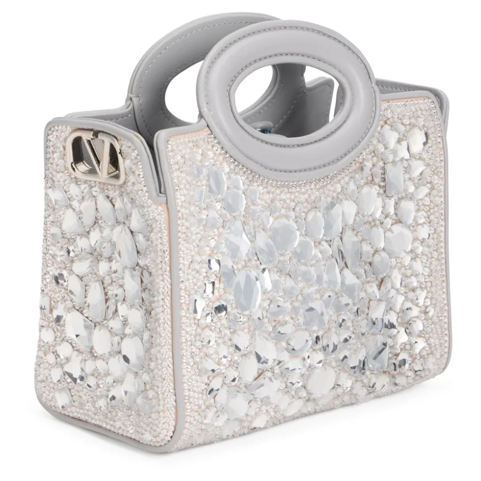 Bolso de mano con pedrería