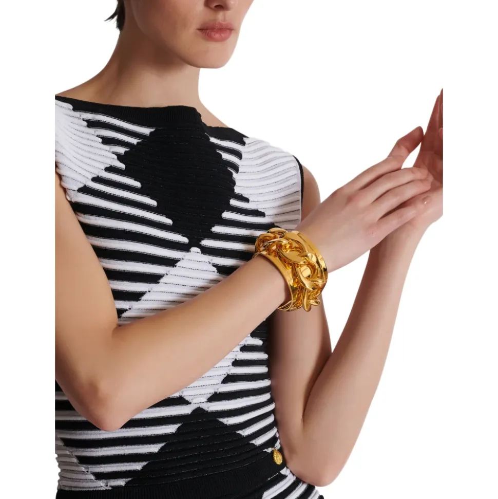 Bra brazalete de cadena con puño