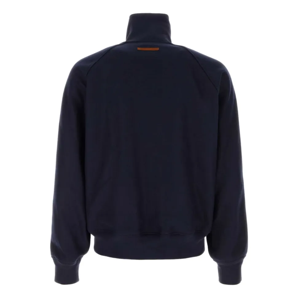 Chaqueta con cremallera y banda lateral