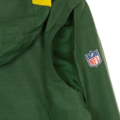 Chaqueta ligera de jugador con logotipo del equipo de la NFL