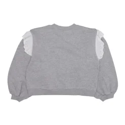 Jersey gris claro con volantes