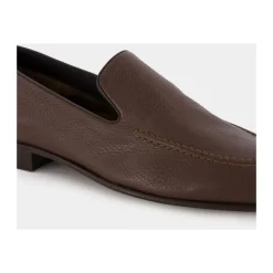 Mocasines de cuero marrón con ribete negro