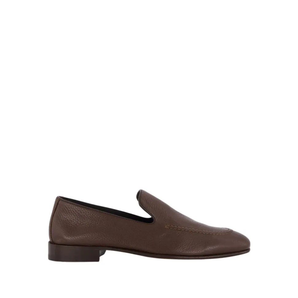 Mocasines de cuero marrón con ribete negro