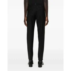 Pantalones de corte slim en lana fría con pedrería