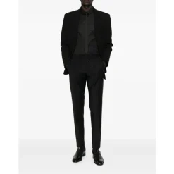 Pantalones de corte slim en lana fría con pedrería