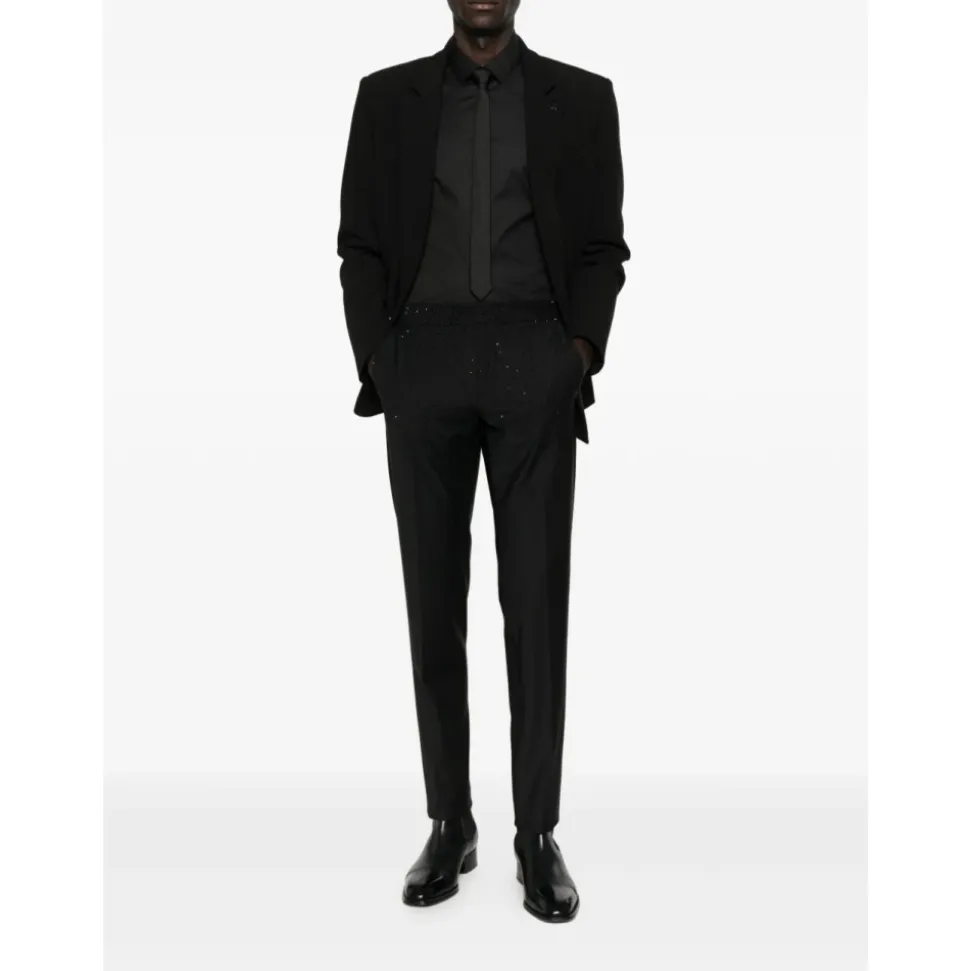 Pantalones de corte slim en lana fría con pedrería