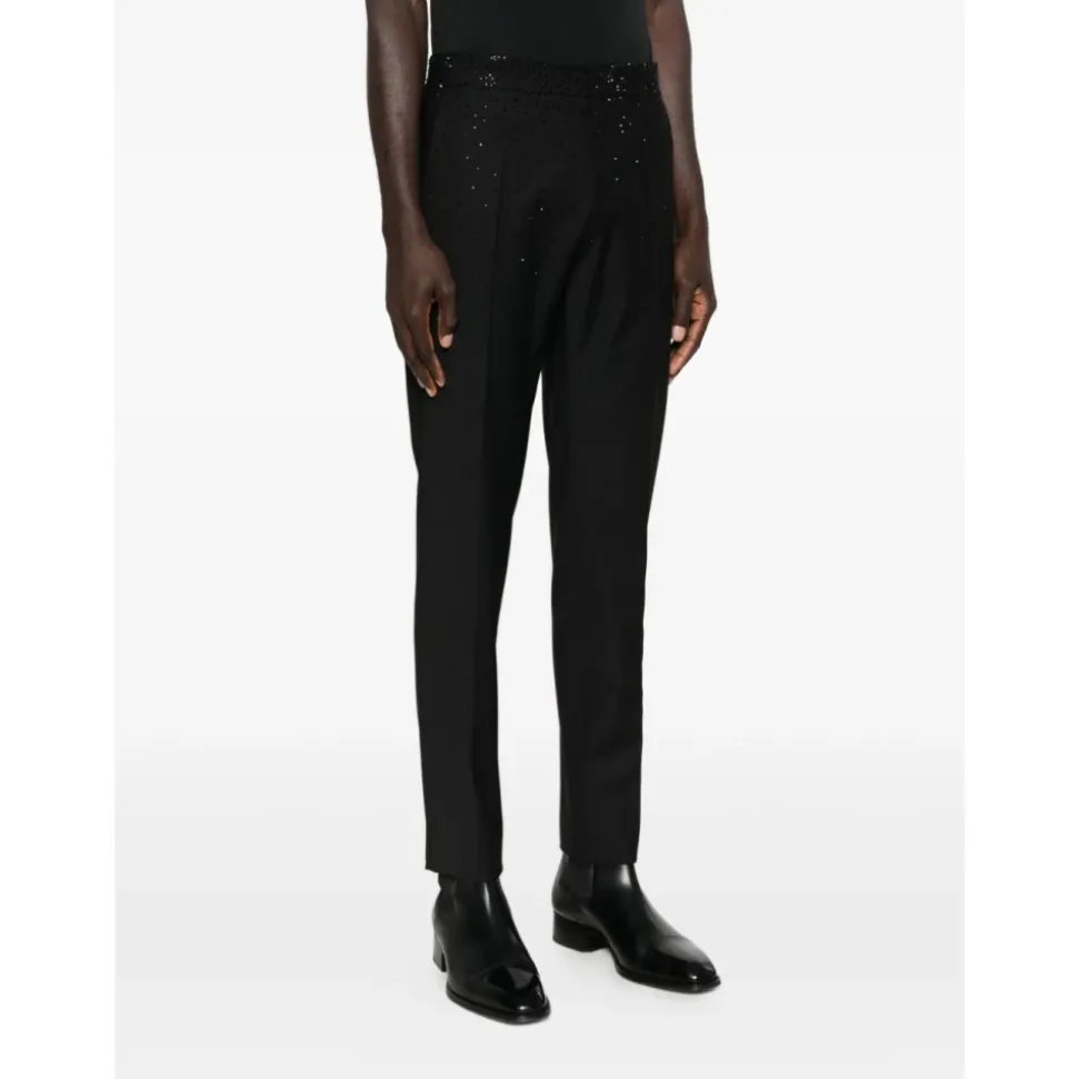 Pantalones de corte slim en lana fría con pedrería