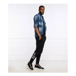 Pantalones deportivos con logo lateral