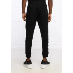 Pantalones deportivos con logo lateral