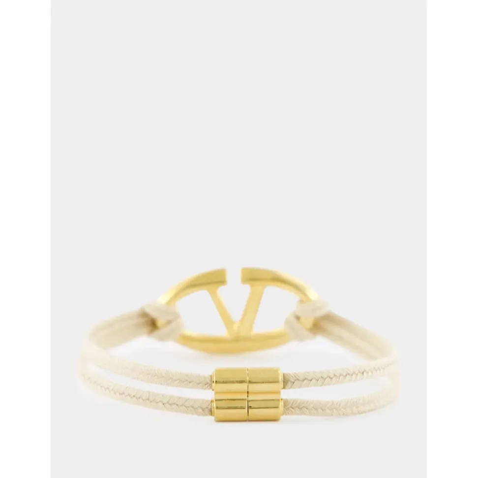 Pulsera de Cordón Beige con Detalle Dorado