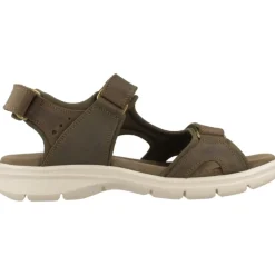 Sandalias planas elegantes con correa adhesiva