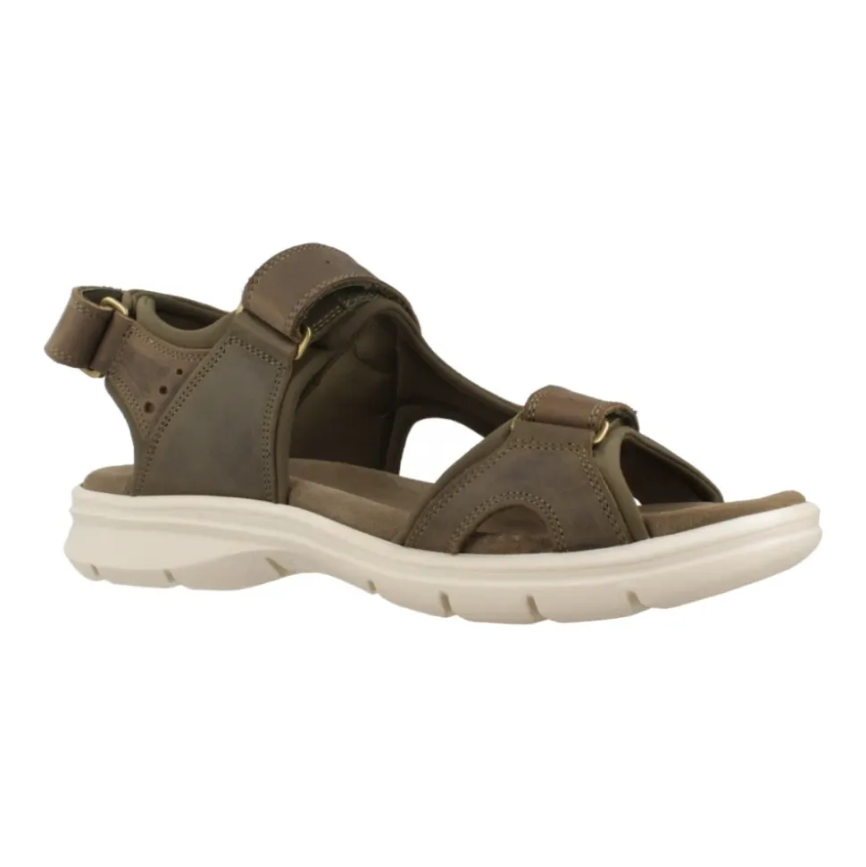 Sandalias planas elegantes con correa adhesiva