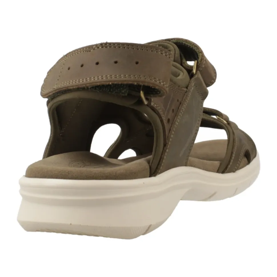 Sandalias planas elegantes con correa adhesiva