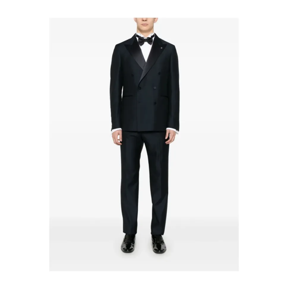 Traje
