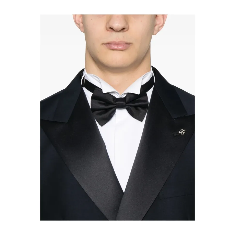 Traje