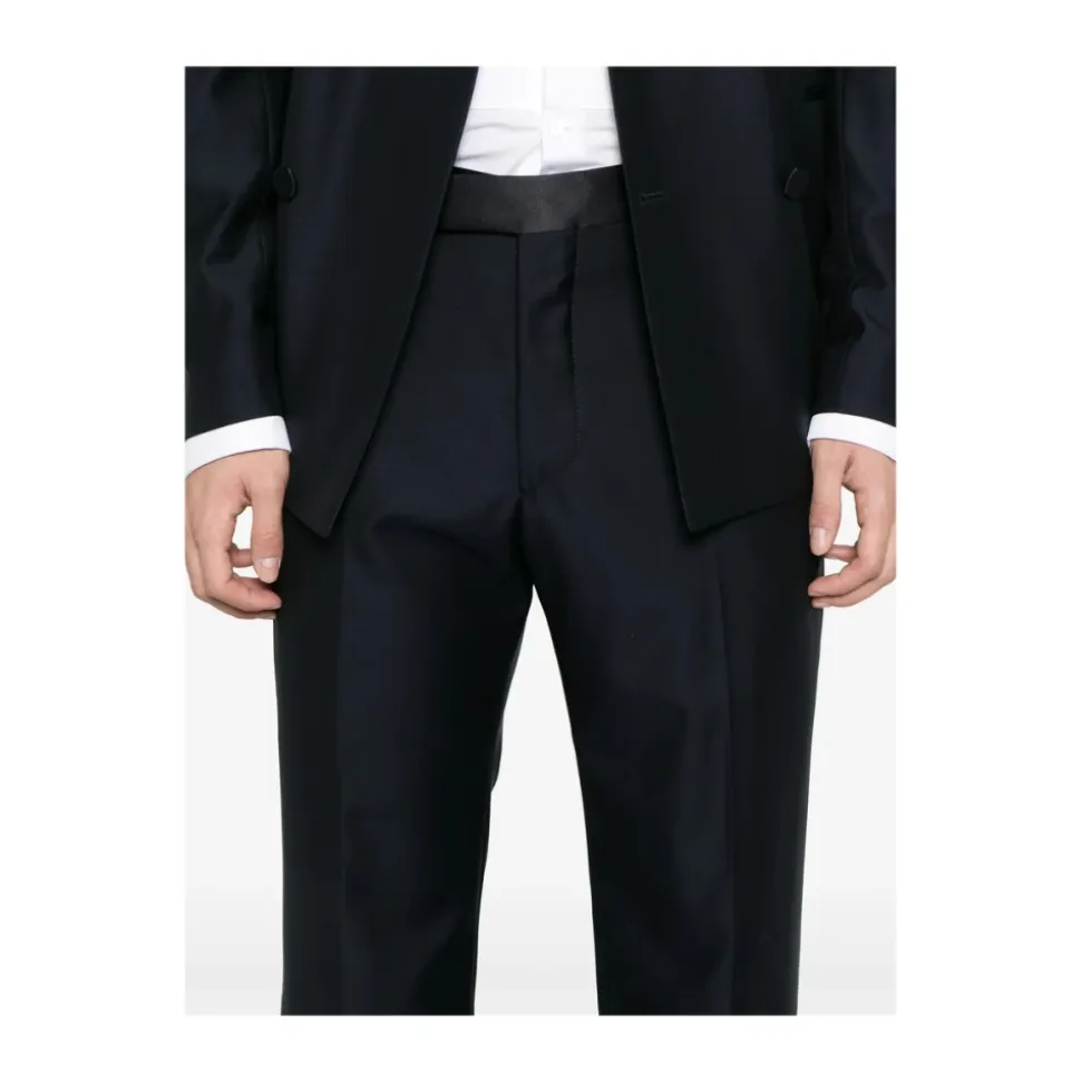Traje