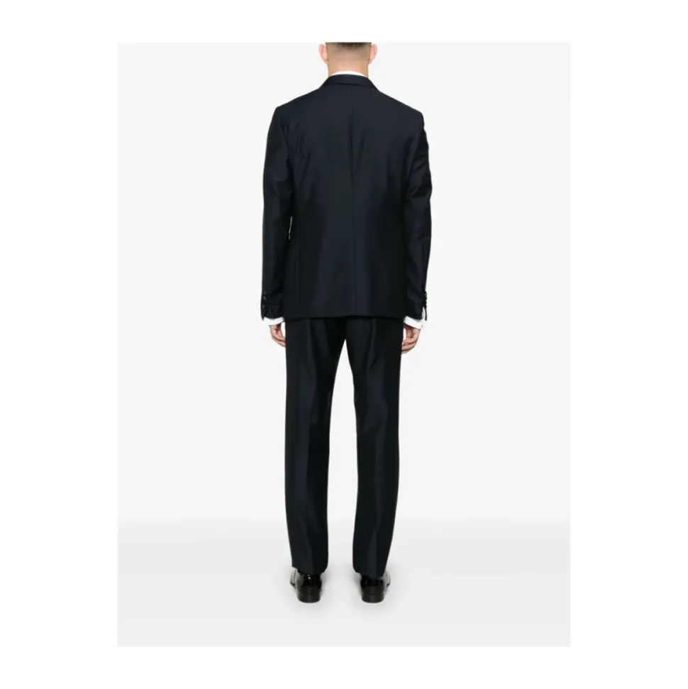 Traje