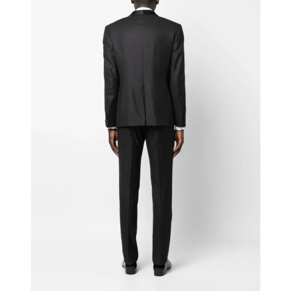 Traje de tres piezas cruzado sencillo