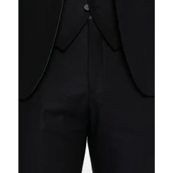 Traje de tres piezas cruzado sencillo