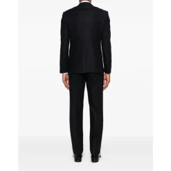 Traje de tres piezas cruzado sencillo