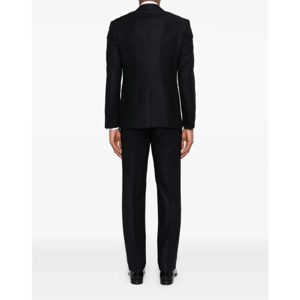 Traje de tres piezas cruzado sencillo
