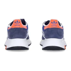 Zapatilla baja azul con detalles blancos