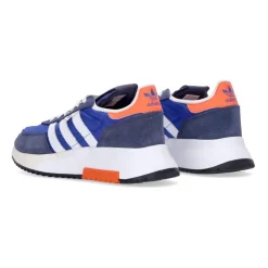 Zapatilla baja azul con detalles blancos