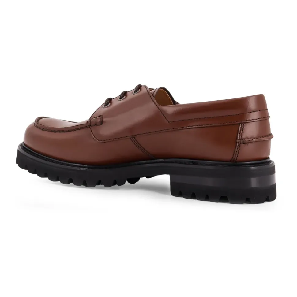 Zapatos planos con detalle de logo