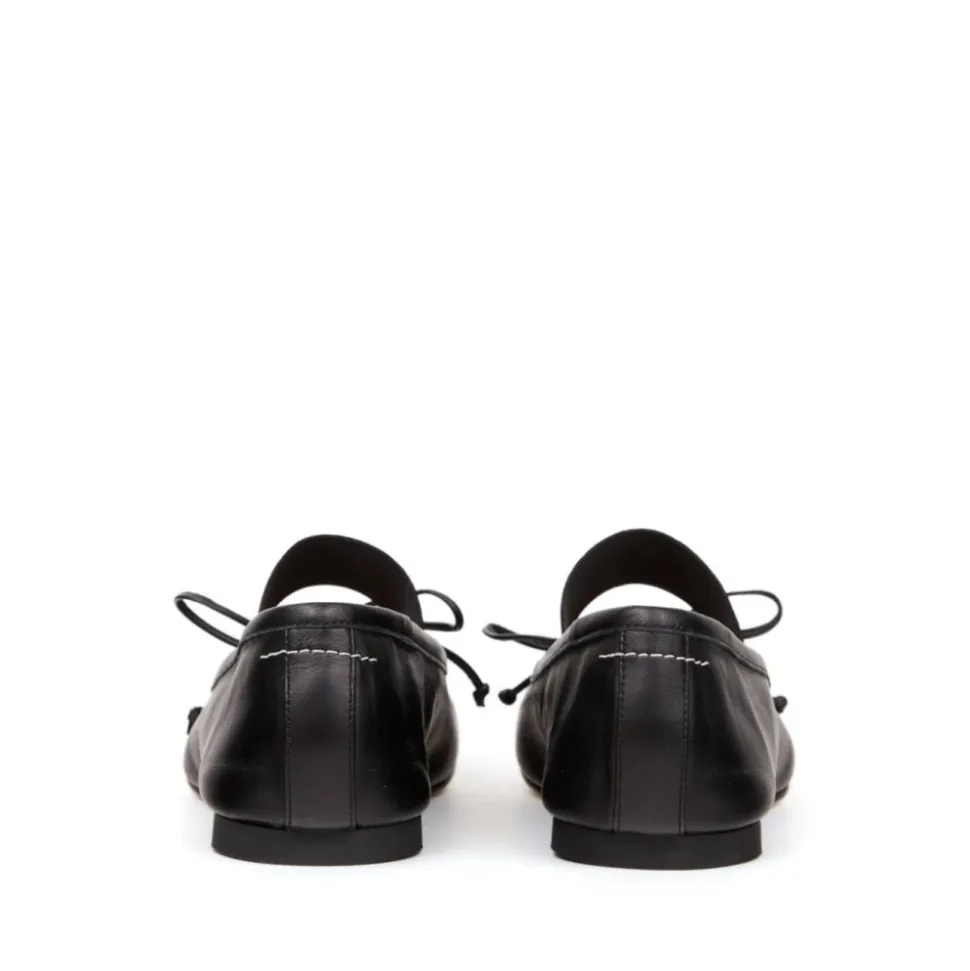Zapatos planos con lazo de cuero
