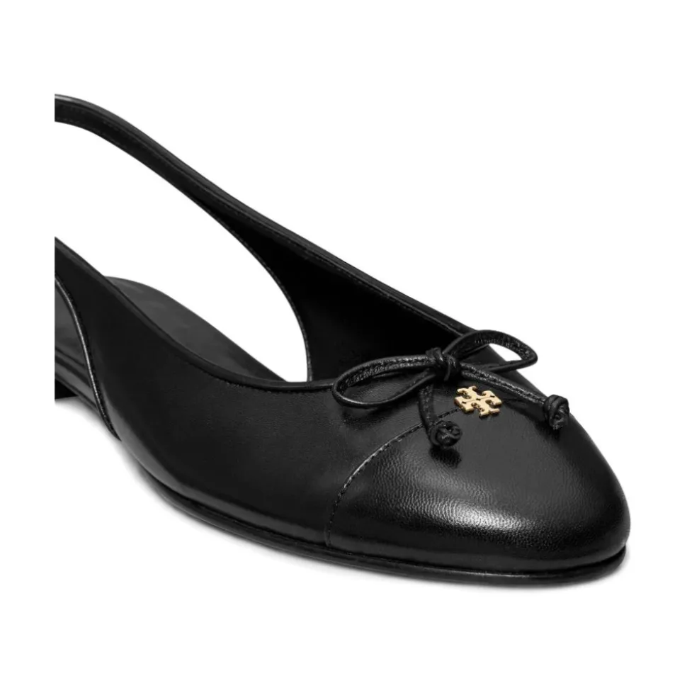 Zapatos planos negros con correa en el tobillo